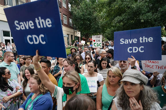 Protestors walk out in support of CDC chief